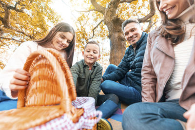 People sitting in park during winter