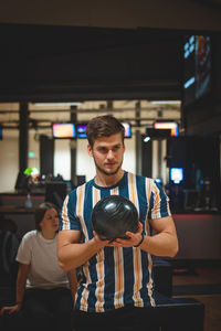 Professional bowler throws his throw and is in position to watch his ball. bowling life. 