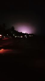 Illuminated street light at night