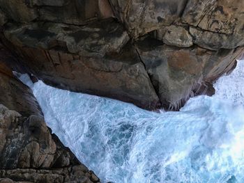 Scenic view of rock formation in sea