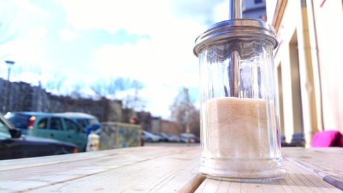 Close-up of glass jar on table