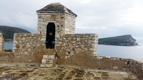 View of castle against cloudy sky