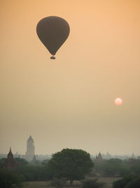 Hot air balloon against sky during sunset