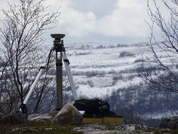 Geodetic equipment against sky