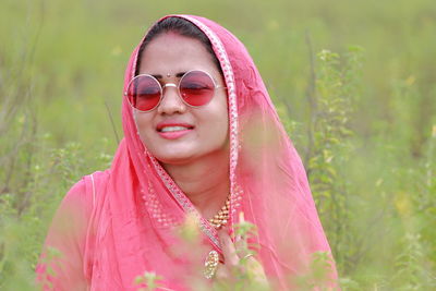 Portrait of woman with pink hair