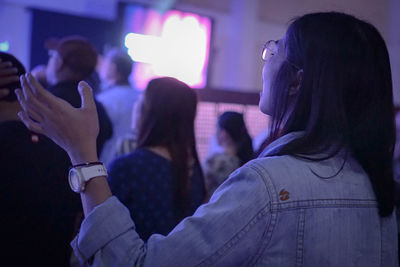 Group of people at music concert