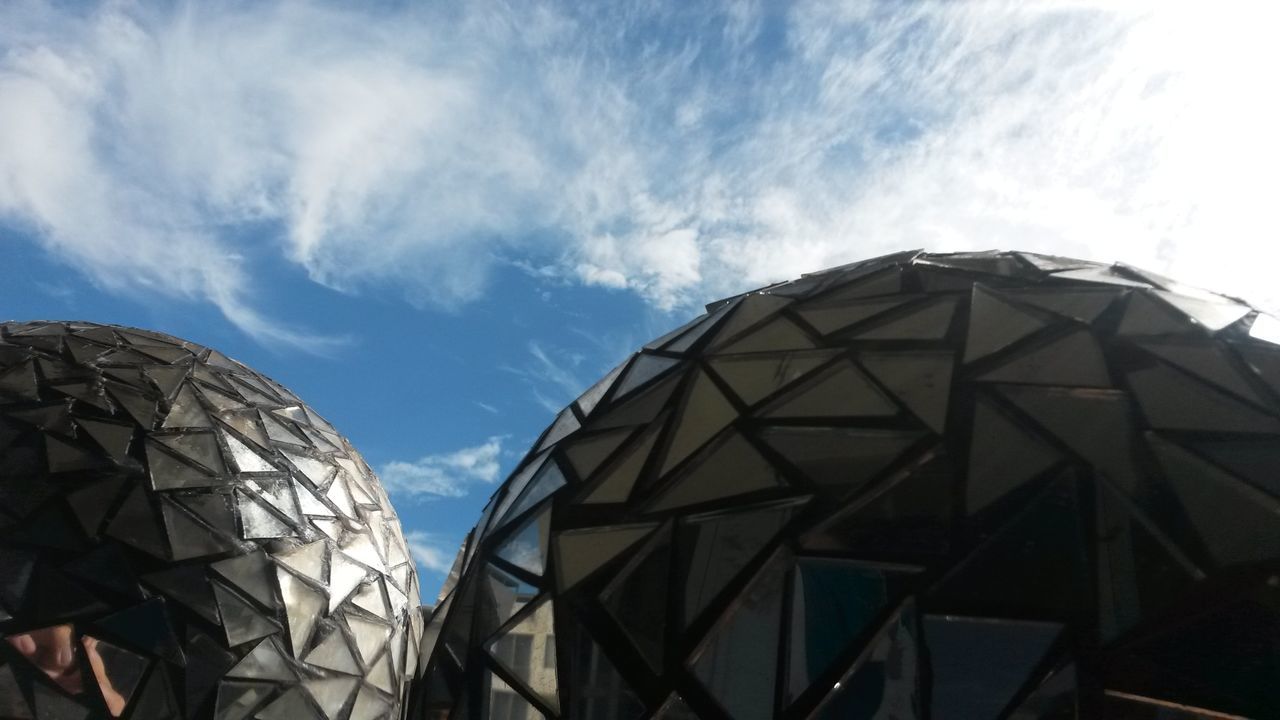 architecture, low angle view, built structure, building exterior, sky, dome, pattern, cloud - sky, glass - material, modern, architectural feature, day, blue, famous place, city, cloud, outdoors, no people, travel destinations, design