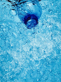 Full frame shot of blue water in swimming pool