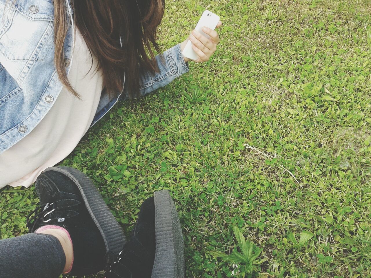 low section, grass, person, lifestyles, leisure activity, shoe, field, high angle view, grassy, men, human foot, standing, personal perspective, part of, footwear, casual clothing