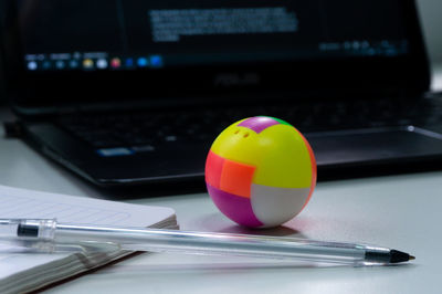 Close-up of mobile phone on table