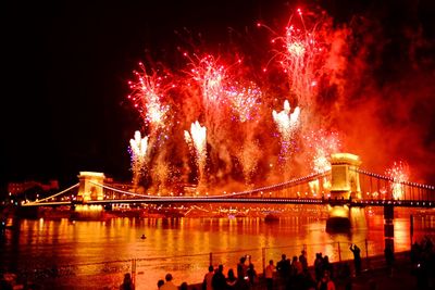 Low angle view of sky illumed with fire crackers