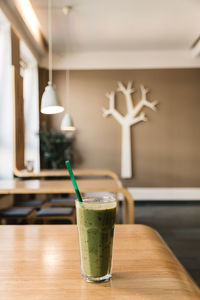 Close-up of matcha smoothie on table