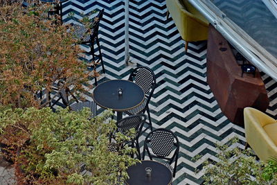 High angle view of tree and buildings in city