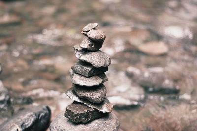 Close-up of stone stack on rock