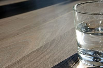 High angle view of glass on table