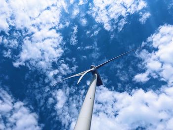 Low angle view of wind turbine against sky