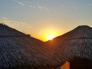Scenic view of mountain against sky during sunset