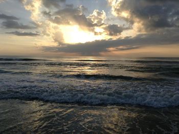 Scenic view of sea at sunset