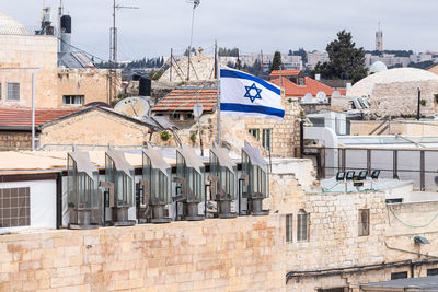 Buildings in city against sky