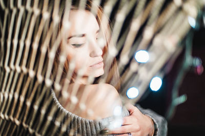 Close-up of woman with hands