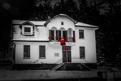 House against clear sky during winter