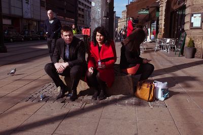 Woman standing in city