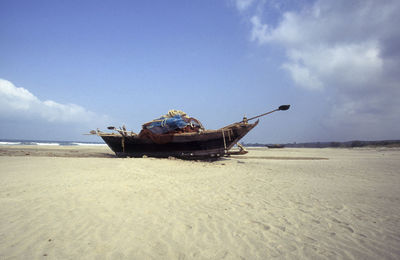 Boat in sea against sky