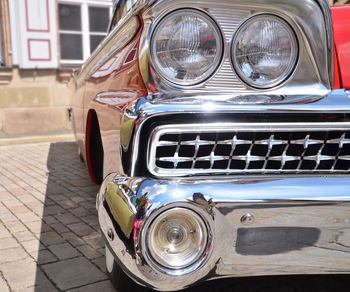 Close-up of vintage car on street