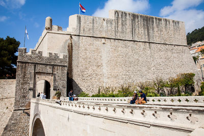 Tourists at ploce gate on the beautiful dubrovnik city walls