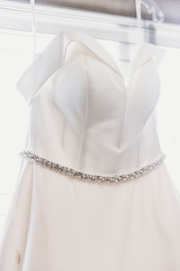 Close-up of white bag hanging in store