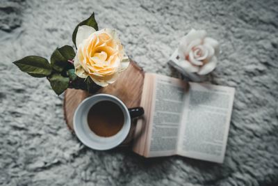 Close-up of cup and coffee on table