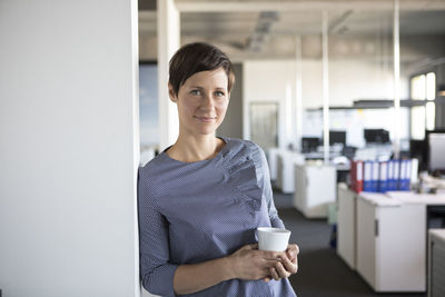 Portrait of confident businesswoman in office