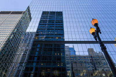 Low angle view of man walking on street