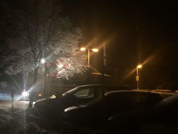 Illuminated street light at night