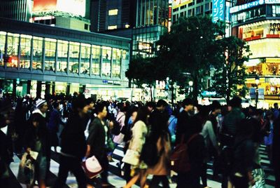 People walking on city street