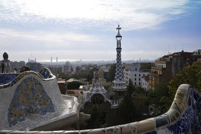 Panoramic view of buildings in city against sky