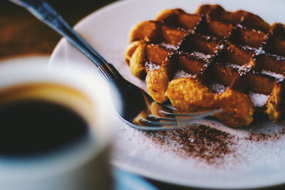 Close-up of dessert served on table