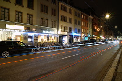 Light trails on city street at night