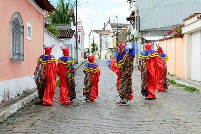 Group of people wearing venice carnival costumes during the carnival 