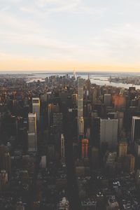 Cityscape against sky during sunset