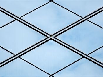 Low angle view of metallic structure against sky