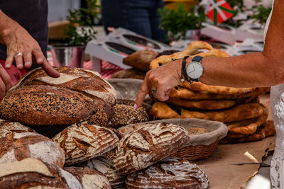 Close-up of man preparing food on table