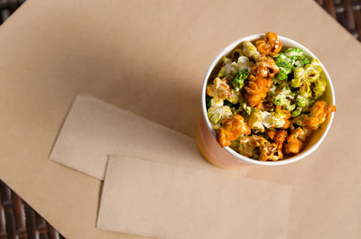 High angle view of salad in bowl on table