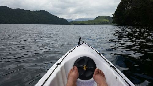 Scenic view of lake with mountain in background