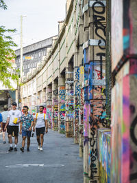 People walking on street in city