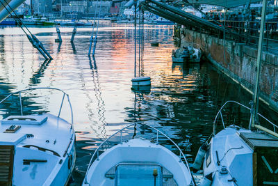 High angle view of boats moored at harbor