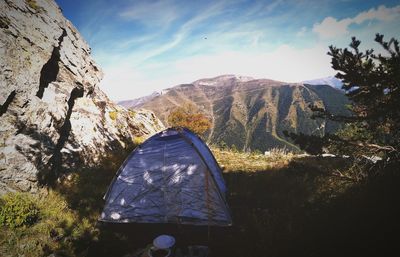 View of landscape against mountain range