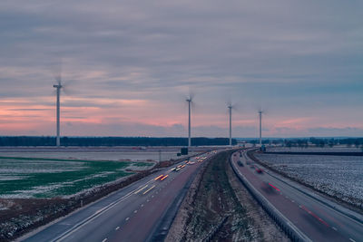 Highway against sky at night