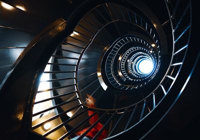 Low angle view of spiral staircase in building