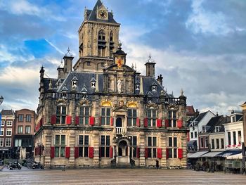 Low angle view of cathedral against cloudy sky